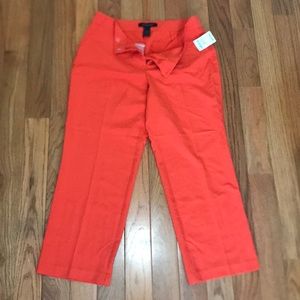 Dress pants in bright tangerine/orange color